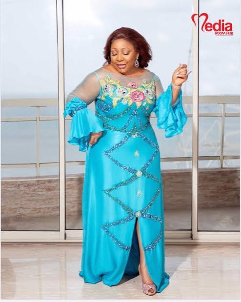 Senator Florence Ita-Giwa in a turquoise embroidered gown