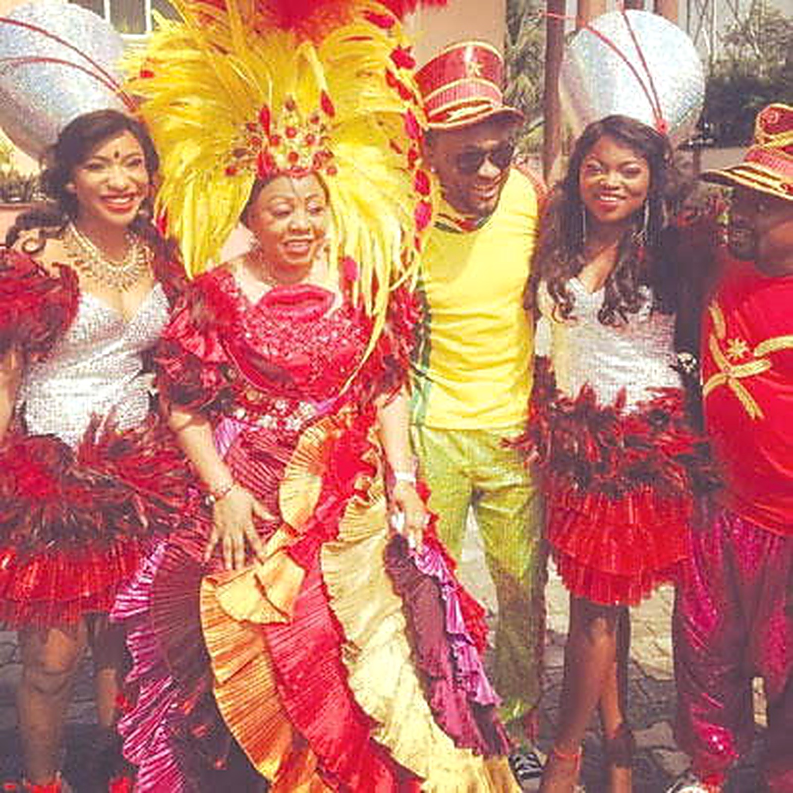 Seagull Band performer in gold carnival costume