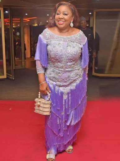 Senator Florence Ita-Giwa in a purple fringed gown