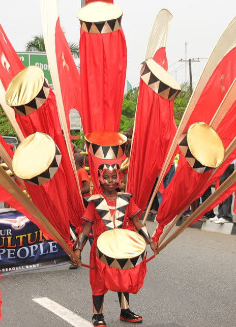 Young performer in peacock costume